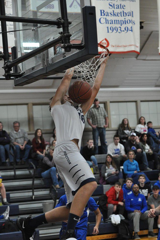 Grangeville's Colby Kennedy dunks against McCall-Donnelly